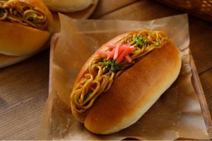 spaghetti in a hot dog bun